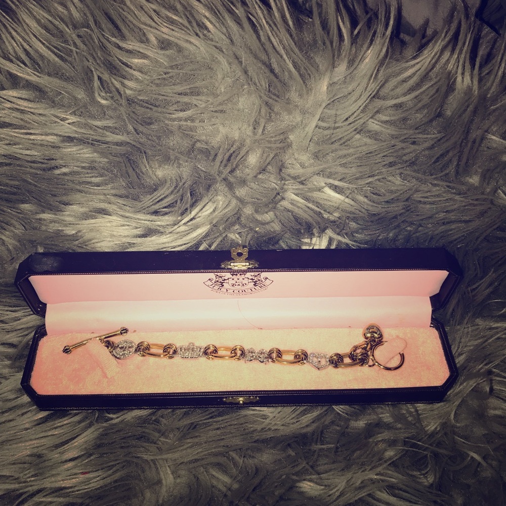 Gently worn collectorsJuicy Couture charm bracelet
